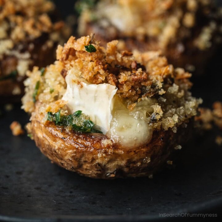 A stuffed mushroom filled with melted brie and crunchy Panko breadcrumbs.
